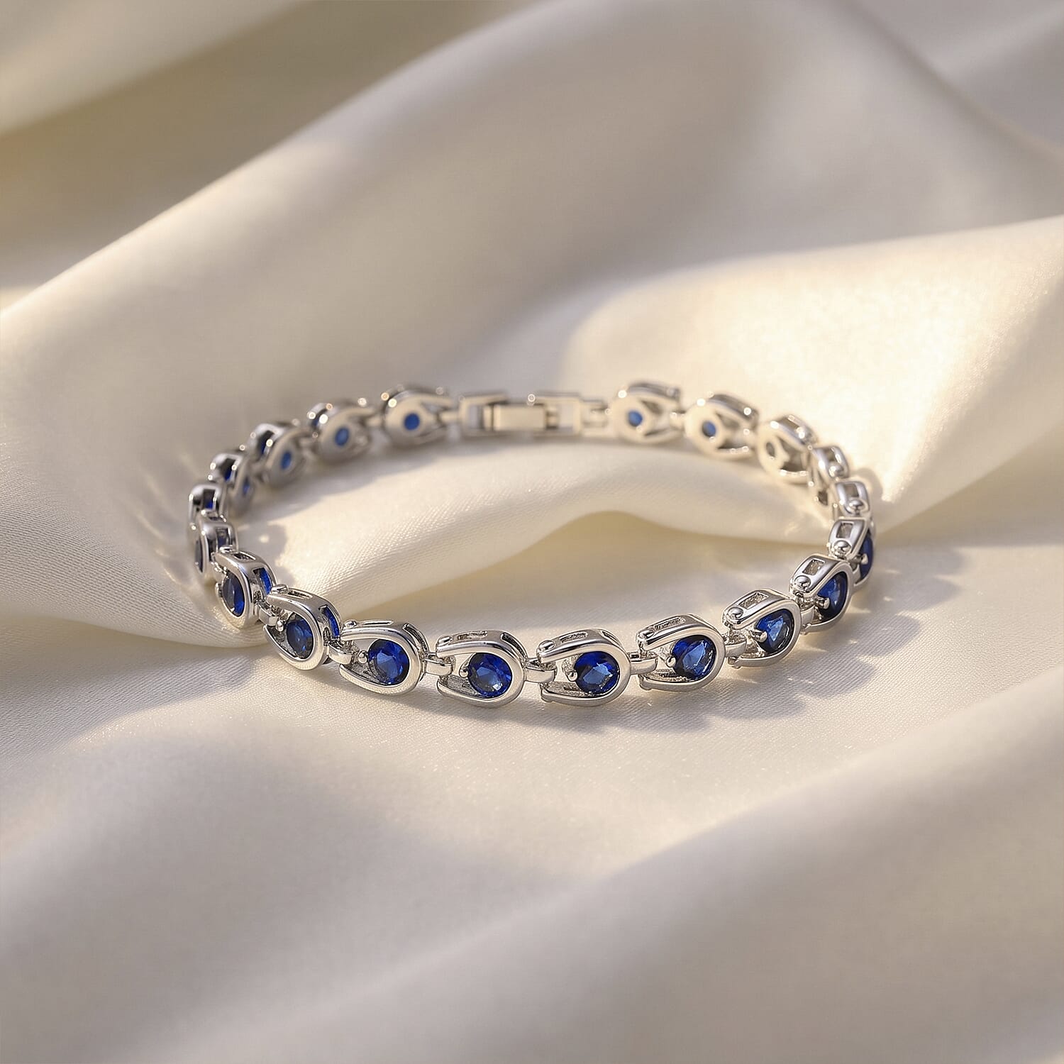 Simulated Blue Sapphire Bracelet in Silvertone (7.50 In)