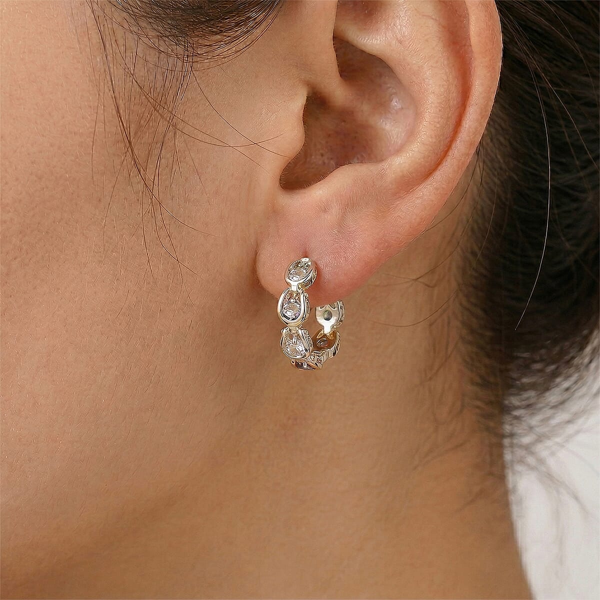 Simulated Diamond Hoop Earrings in Silvertone image number 2