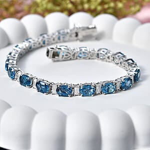 D'Joy London Blue Topaz and Moissanite 20.75 ctw Midnight Blue Tennis Bracelet in Rhodium Over Sterling Silver (7.25 In)