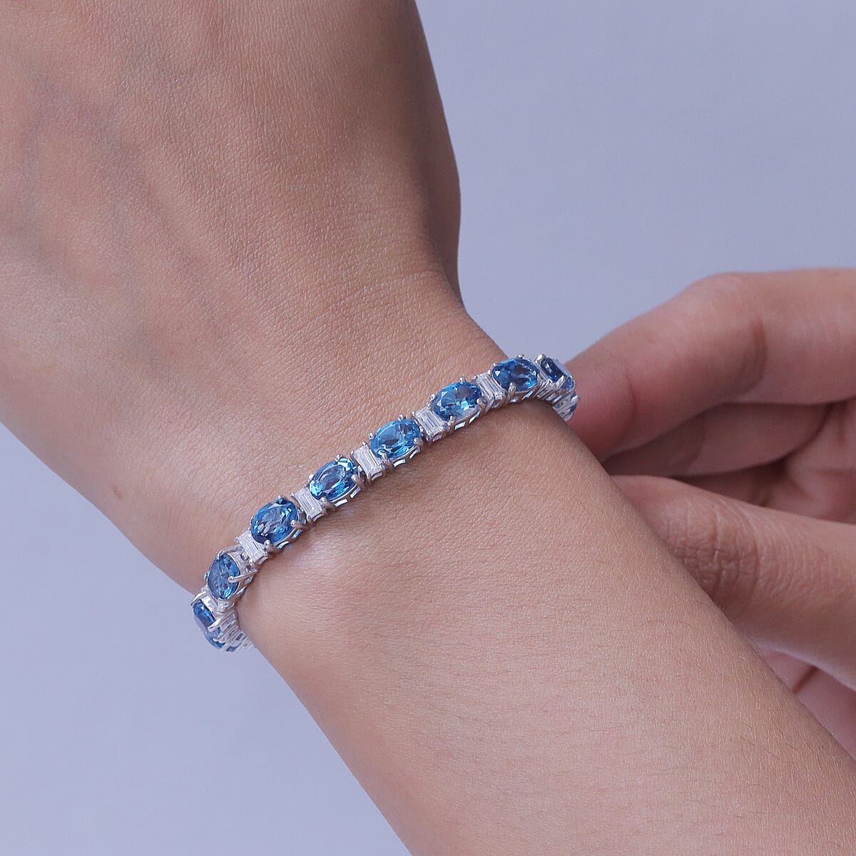 D'Joy London Blue Topaz and Moissanite 20.75 ctw Midnight Blue Tennis Bracelet in Rhodium Over Sterling Silver (7.25 In) image number 2