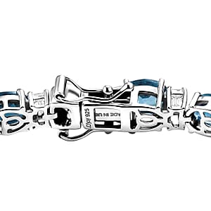 D'Joy London Blue Topaz and Moissanite 20.75 ctw Midnight Blue Tennis Bracelet in Rhodium Over Sterling Silver (7.25 In)