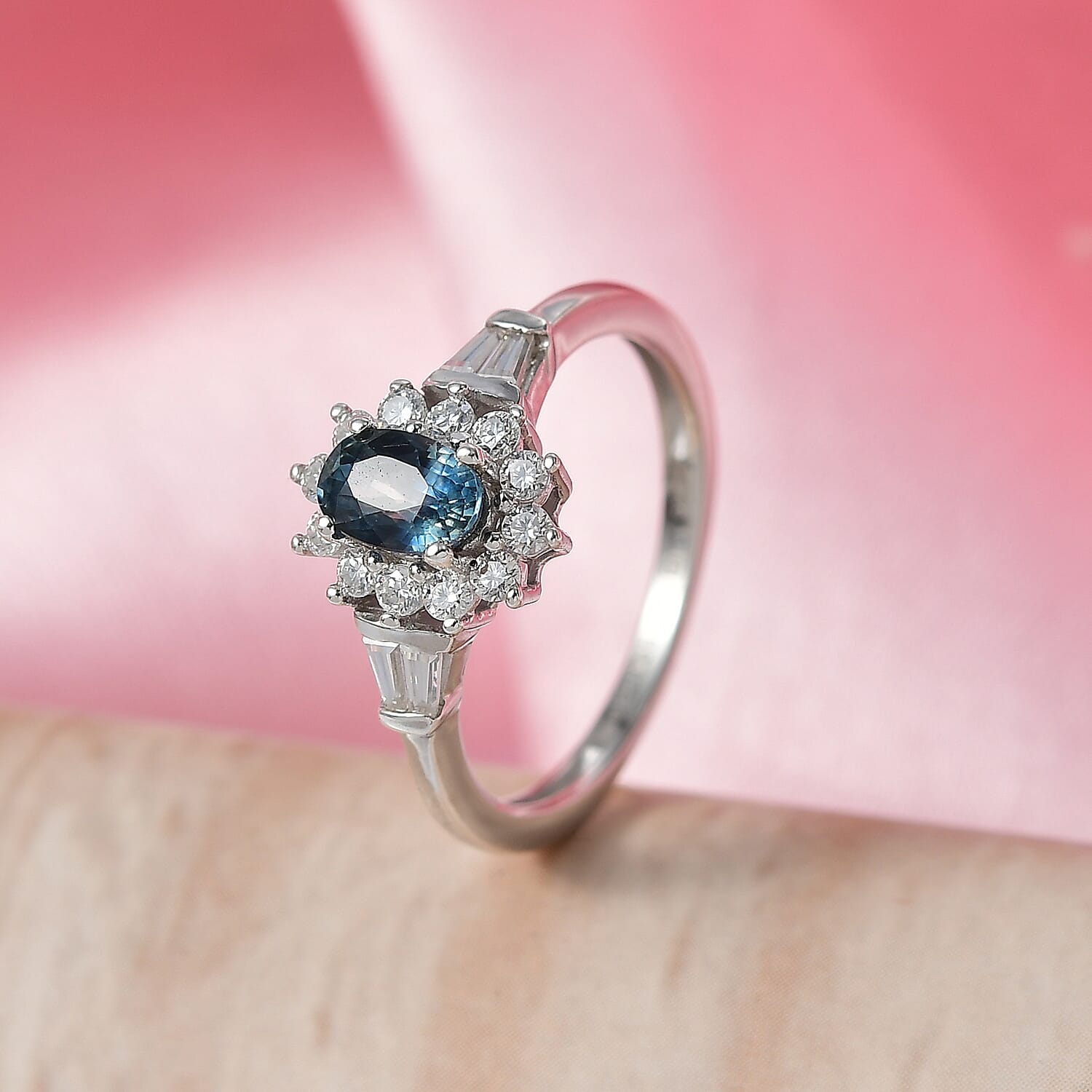 D'Joy Montana Sapphire and Moissanite 1.25 ctw Sunburst Halo Ring in Rhodium Over Sterling Silver (Size 5.0)