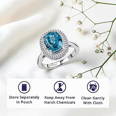 Luxoro AAA Cambodian Blue Zircon and Diamond I2 5.20 ctw Ocean Starlight Halo Ring in 10K White Gold (Size 10.0)