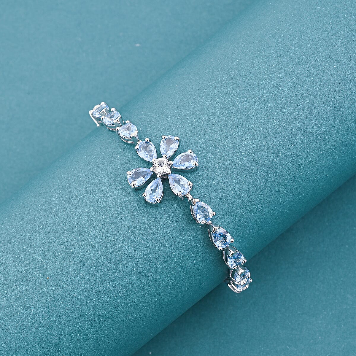 Swiss Blue Topaz and White Corundum 16.40 ctw Bracelet in Rhodium Over Sterling Silver (6.5-7.5In) image number 1