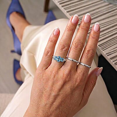 D'Joy Swiss Blue Topaz and Moissanite 0.75 ctw Ring in Rhodium Over Sterling Silver (Size 7.0)