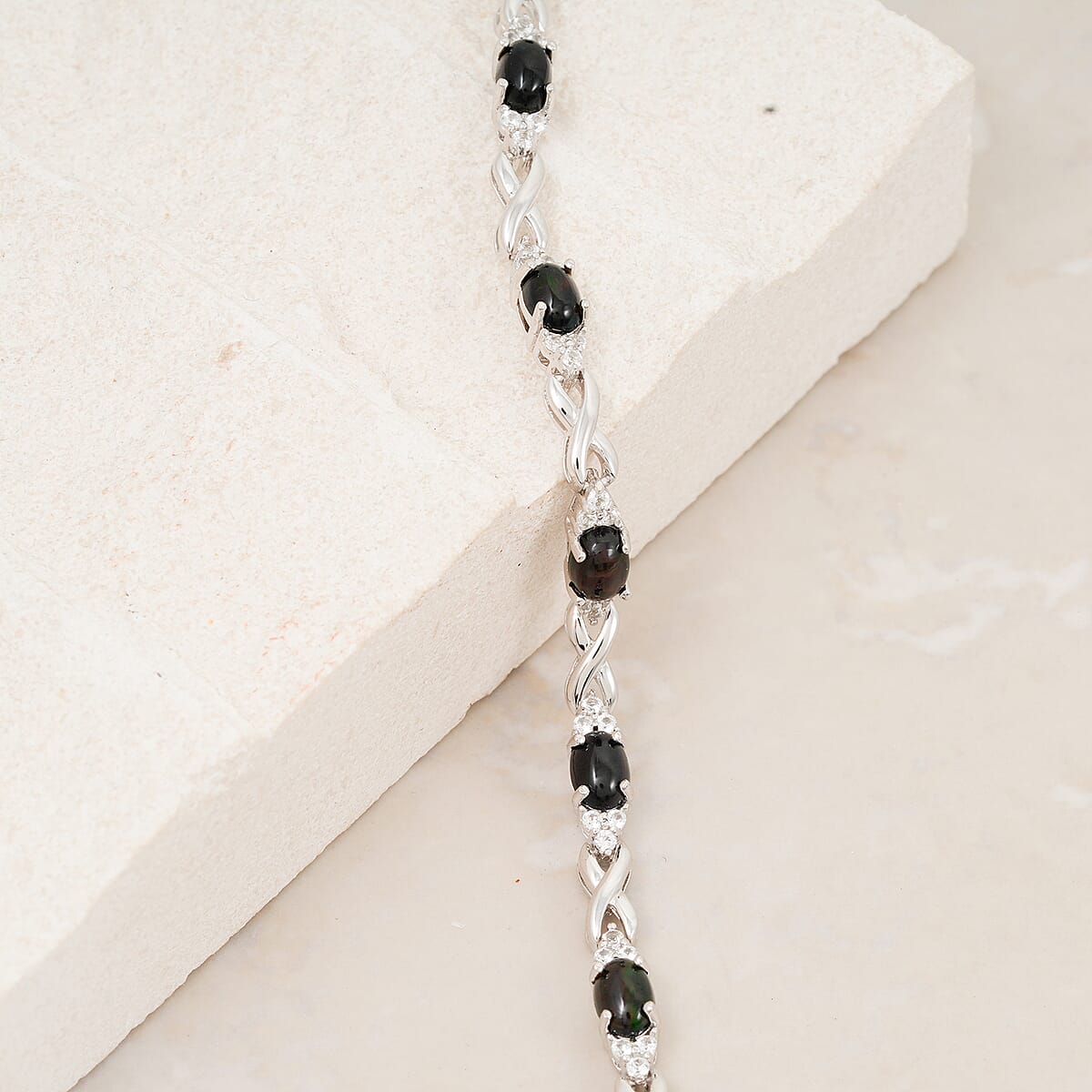 Black Opal and White Corundum 4.20 ctw Bracelet in Rhodium Over Sterling Silver (7-8In) image number 1