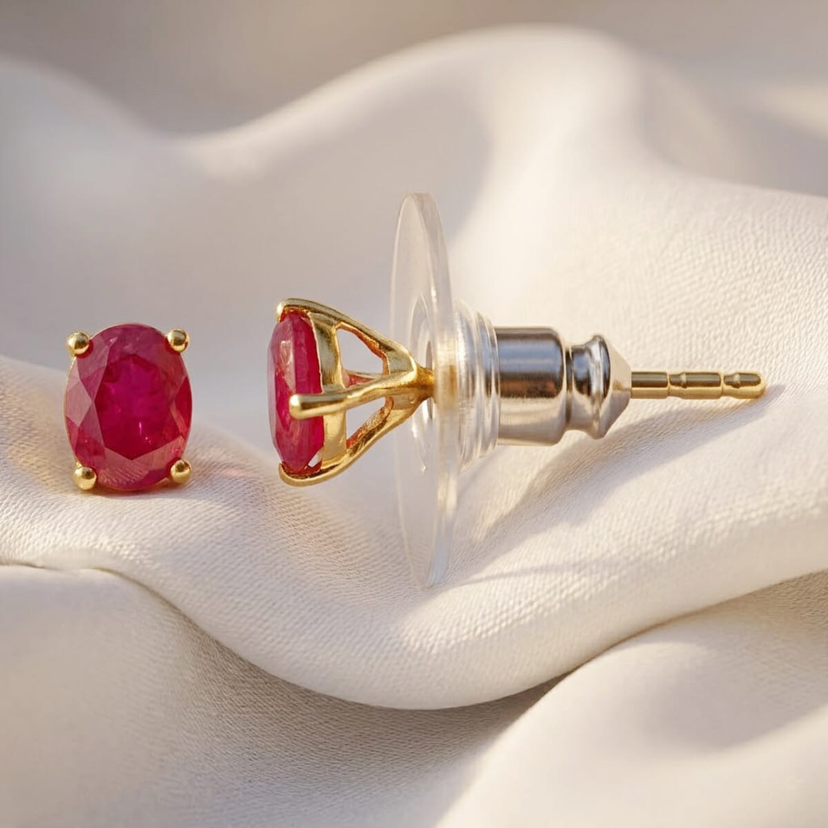 D'Joy Premium Montepuez Ruby 0.90 ctw Solitaire Stud Earrings in 18K Vermeil Yellow Gold Over Sterling Silver image number 1