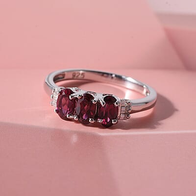 Malawi Magenta Garnet and Moissanite 1.00 ctw Majestic Trio Ring in Rhodium Over Sterling Silver (Size 10.0)