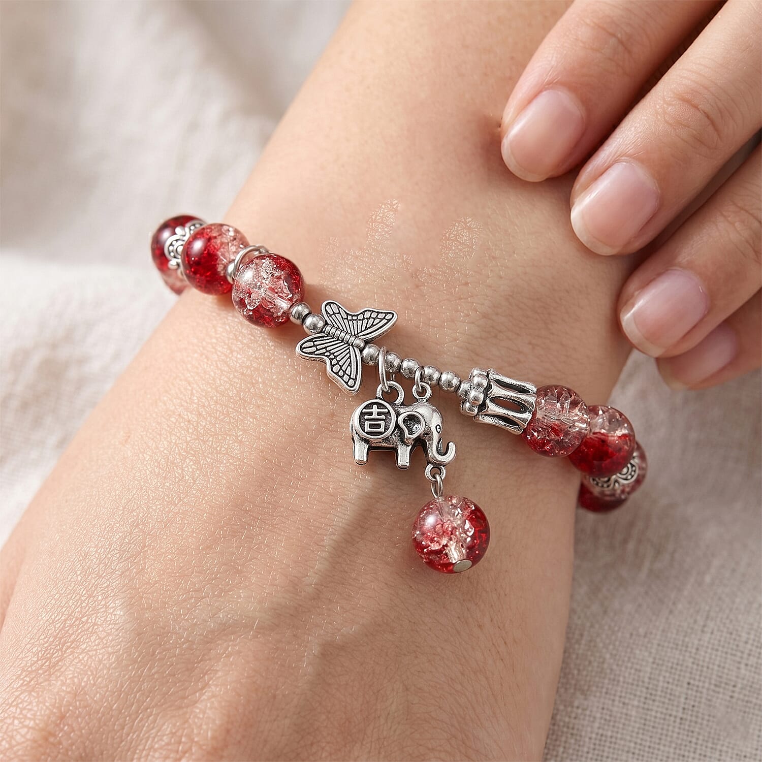 Red Glass Beaded Stretch Bracelet with Butterfly and Elephant Charm in Silvertone