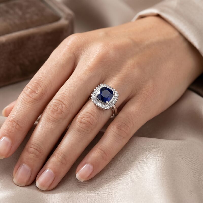 D'Joy Kanchanaburi Blue Sapphire (DF) and Moissanite 3.30 ctw Blue Eclipse Halo Ring in Rhodium Over Sterling Silver (Size 6.0)
