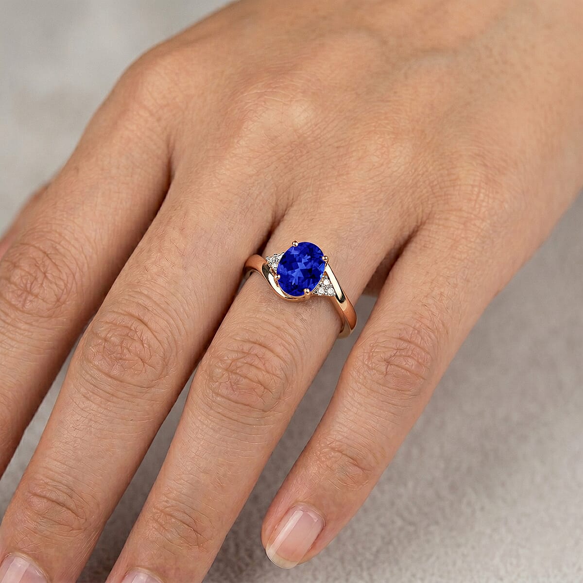 AAAA Tanzanite and Diamond 2.10 ctw Ring in 18K Vermeil Rose Gold Over Sterling Silver (Size 7.5) image number 1
