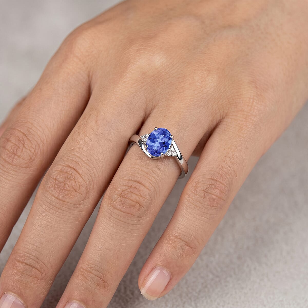 Premium Tanzanite and Diamond I2 2.10 ctw Ring in 10K White Gold (Size 7.0) image number 1