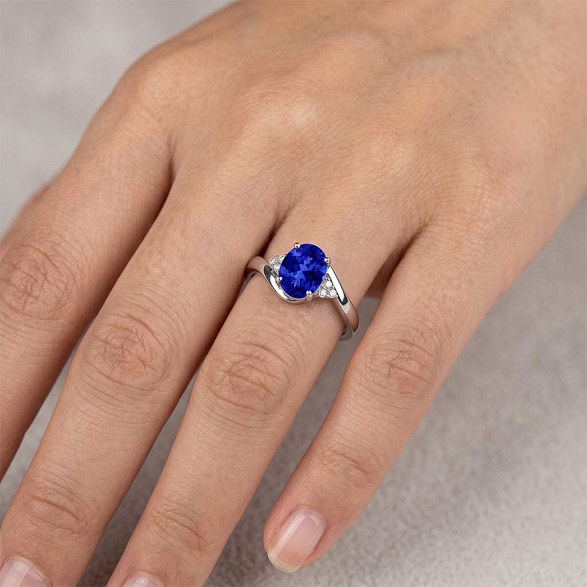 AAAA Tanzanite and Diamond I1 2.10 ctw Ring in 14K White Gold (Size 7.5) 4.20 Grams image number 1