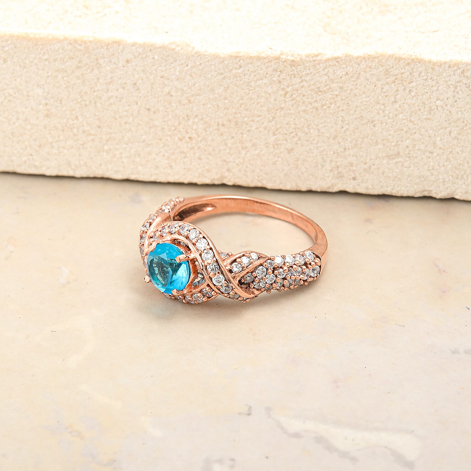 Blue Topaz and Simulated Diamond 1.65 ctw Ring in 14K RG Over Sterling Silver (Size 7.0)