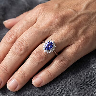 D'Joy Tanzanite and Moissanite 0.80 ctw Ring in Rhodium Over Sterling Silver (Size 10.0)