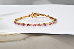 D'Joy Premium Montepuez Ruby and Moissanite 4.70 ctw Blossom Tennis Bracelet in 18K Vermeil Yellow Gold Over Sterling Silver (7.25 In)