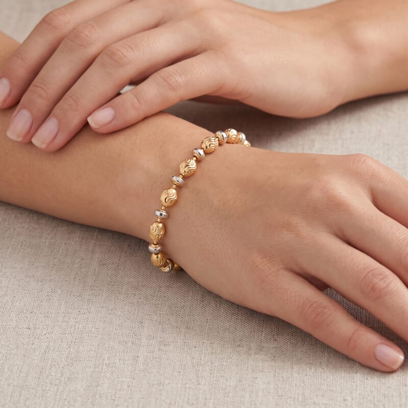 Italian 0.6mm Saturno Chain Bracelet in 14K YG Over and Sterling Silver (7.00 In) 5.30 Grams
