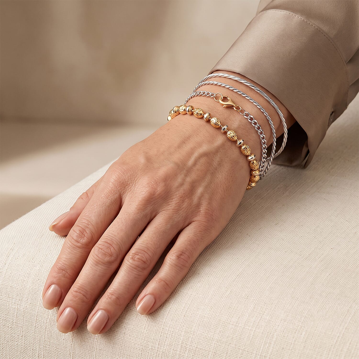 Italian 0.6mm Saturno Chain Bracelet in 14K YG Over and Sterling Silver (7.00 In) 5.30 Grams