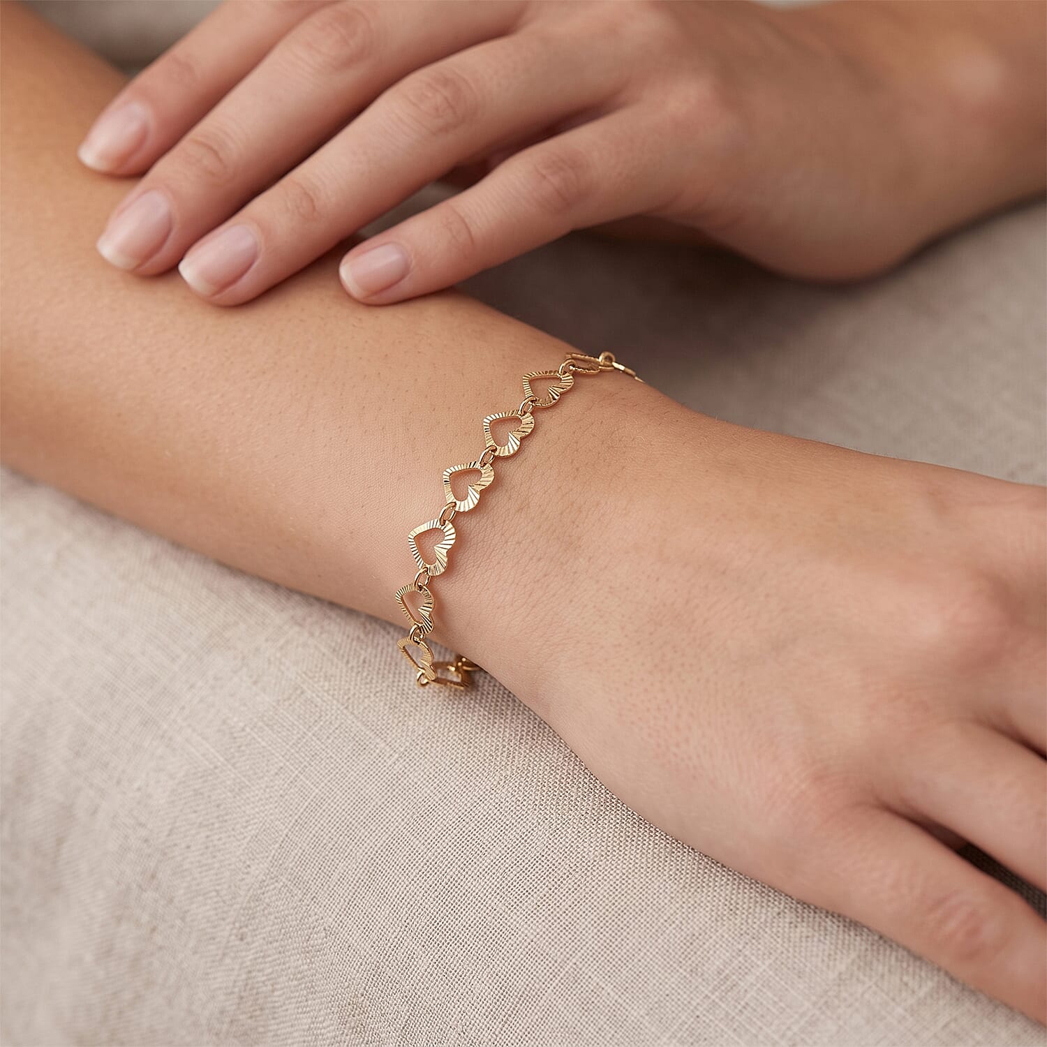 Italian 0.6mm Arte Cuore Chain Bracelet in 14K YG Over Sterling Silver (7.00 In) 2.20 Grams