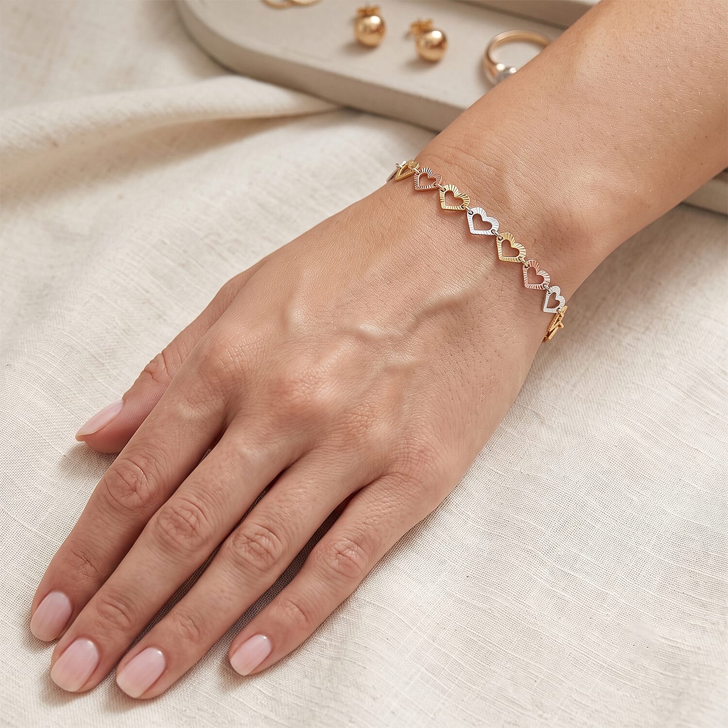 0.6mm Arte Cuore Chain Bracelet in 14K YRG Over and Sterling Silver (7.00 In) 2.20 Grams