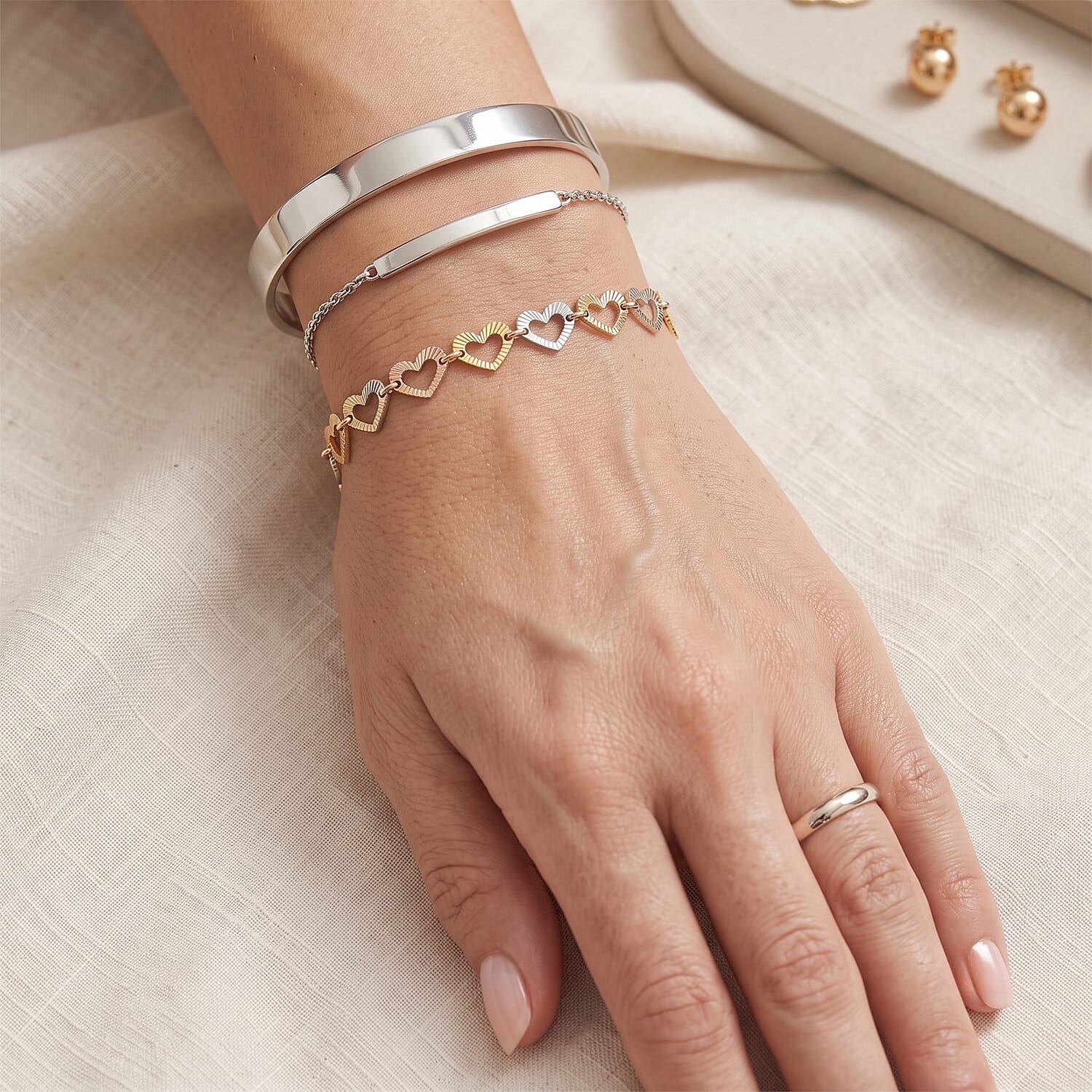 0.6mm Arte Cuore Chain Bracelet in 14K YRG Over and Sterling Silver (7.00 In) 2.20 Grams