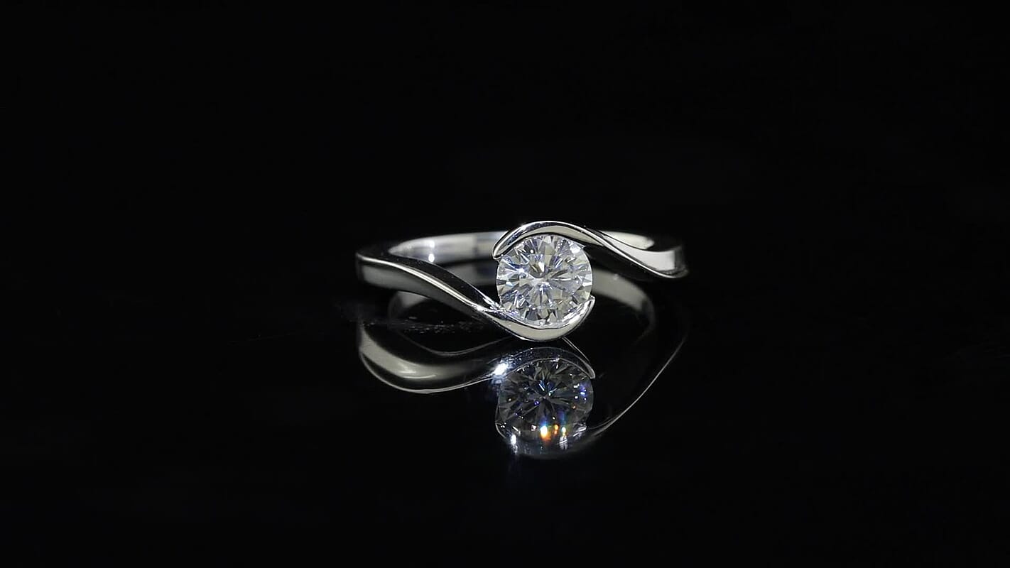 D''Joy Moissanite (Rnd 6mm) Ring in Rhodium Over Sterling Silver (Size 10.0) 0.75 ctw
