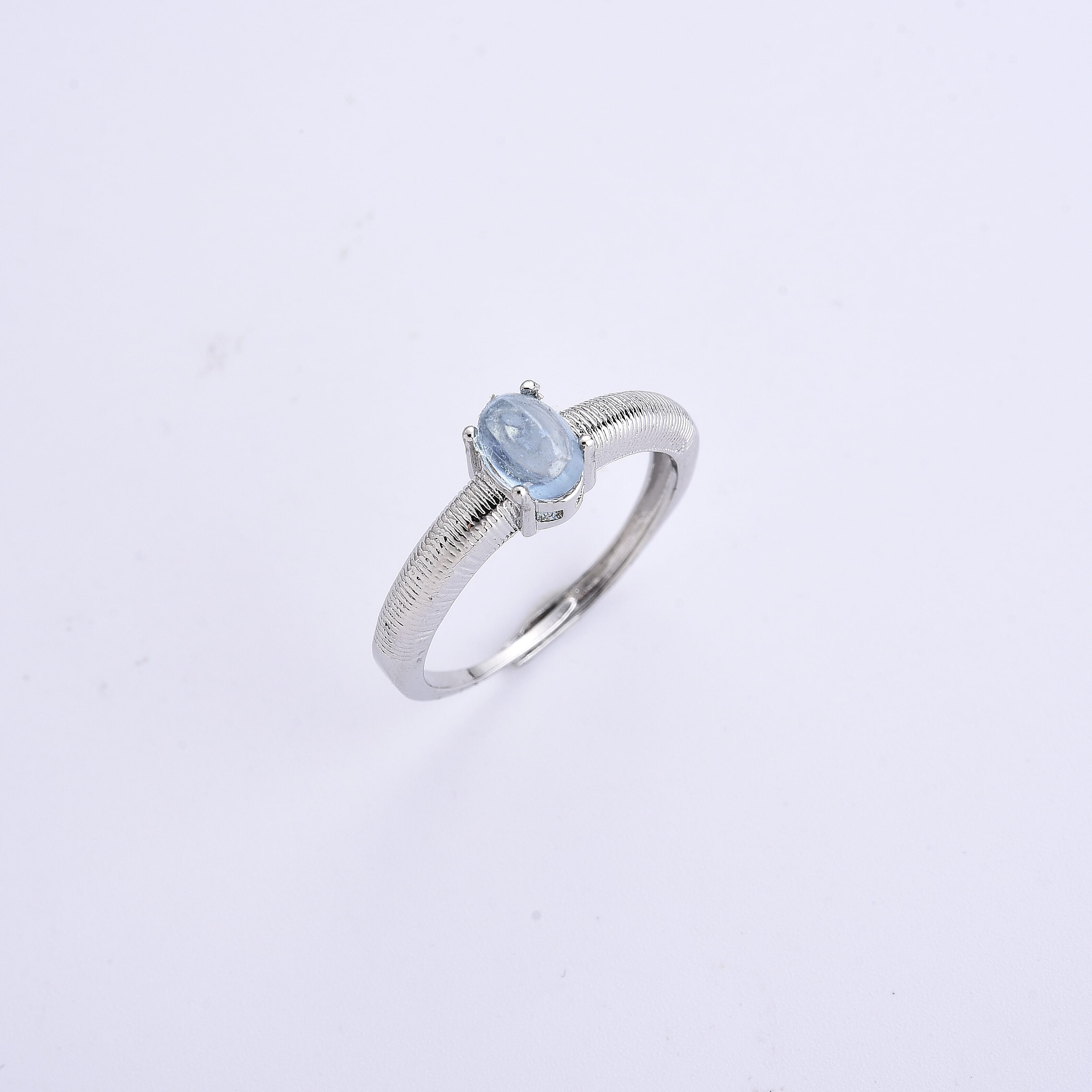 Aquamarine 0.60 ctw Ring in Silvertone (Adjustable)
