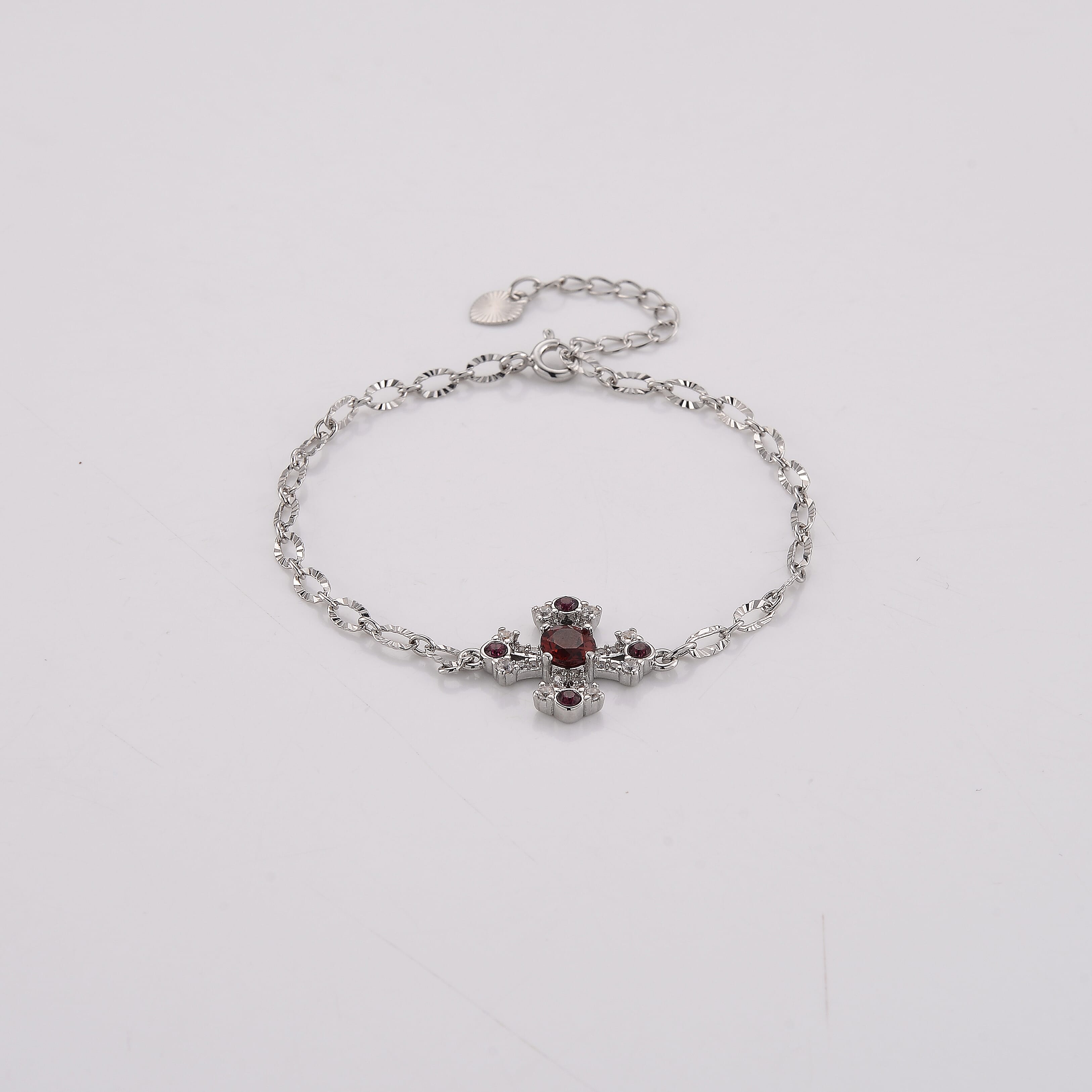 Mozambique Garnet and Simulated Diamond 0.68 ctw Bracelet in Silvertone (6-7In)