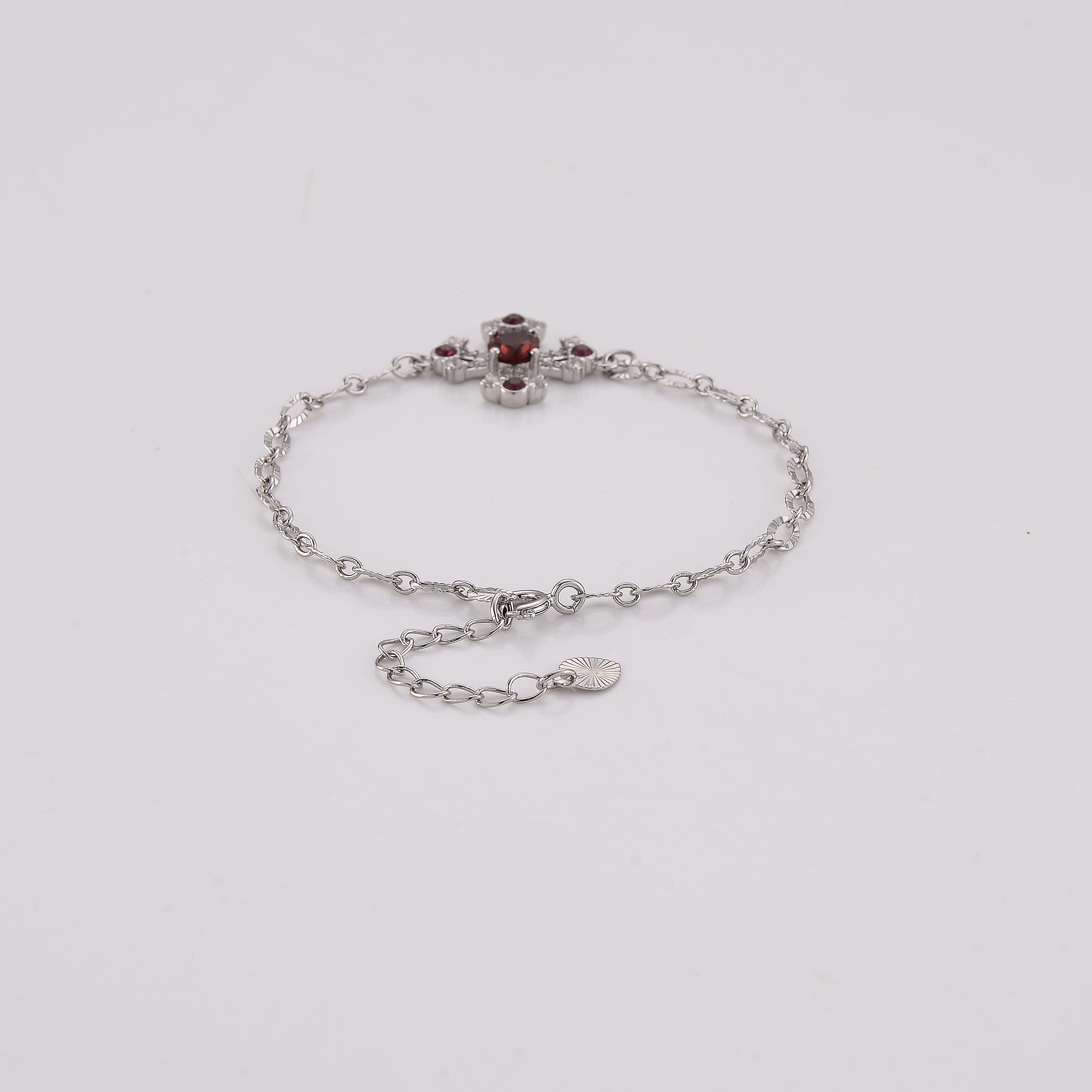 Mozambique Garnet and Simulated Diamond 0.68 ctw Bracelet in Silvertone (6-7In)