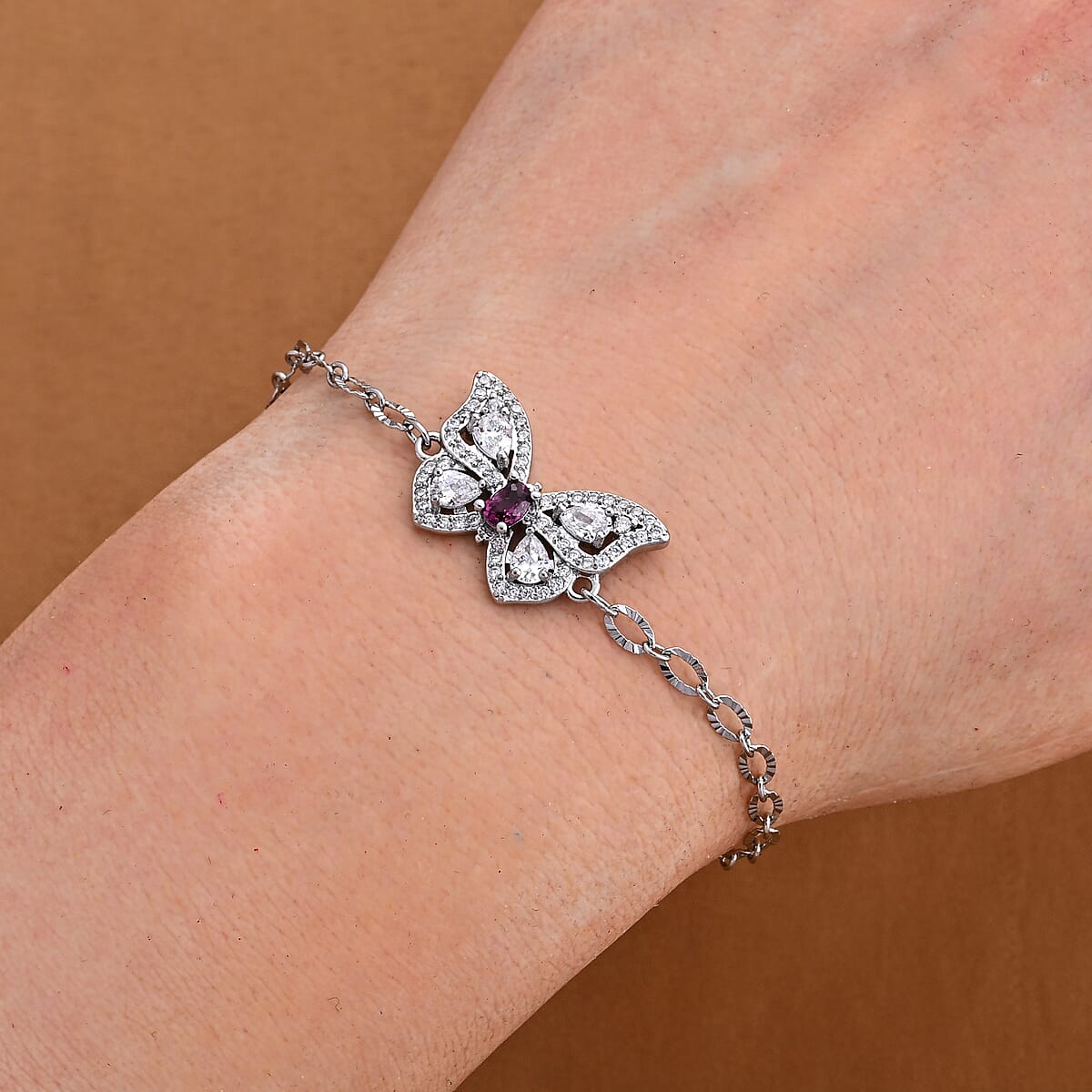 Mozambique Garnet and Simulated Diamond 1.20 ctw Bracelet in Silvertone (6-7In) image number 1
