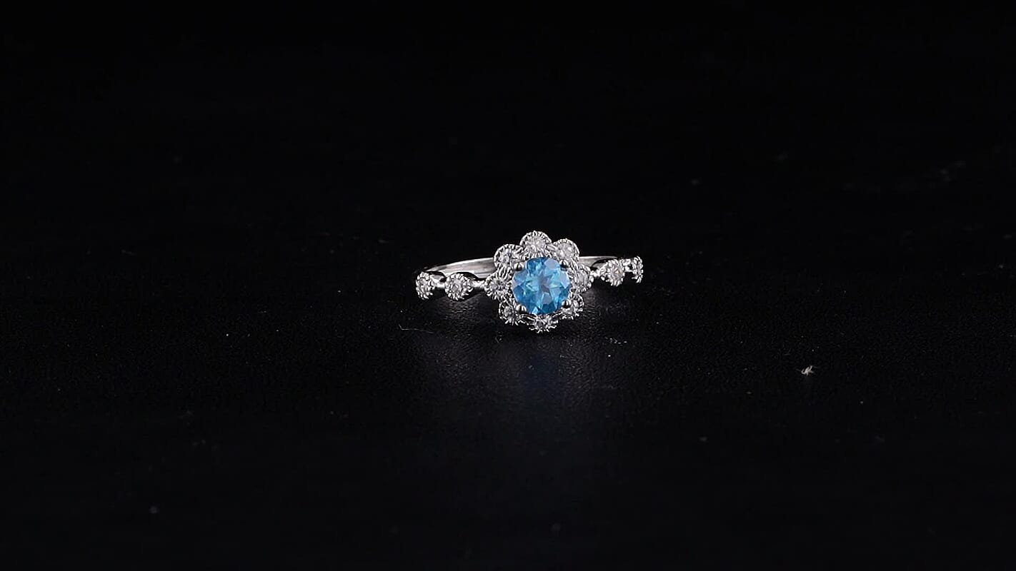 Blue Topaz and Simulated Diamond Ring in Silvertone (Adjustable) 2.00 ctw