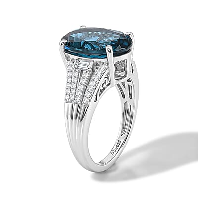 D'Joy London Blue Topaz and Moissanite 7.40 ctw Ocean Citadel Ring in Rhodium Over Sterling Silver (Size 6.0)