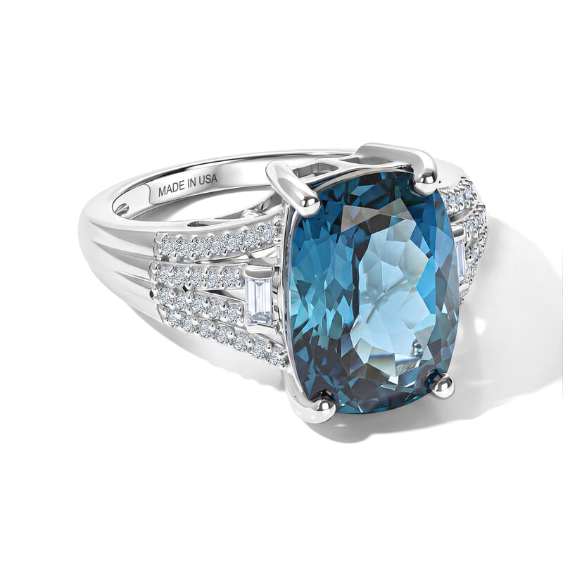 D'Joy London Blue Topaz and Moissanite 7.80 ctw Ocean Citadel Ring in Rhodium Over Sterling Silver (Size 6.0)