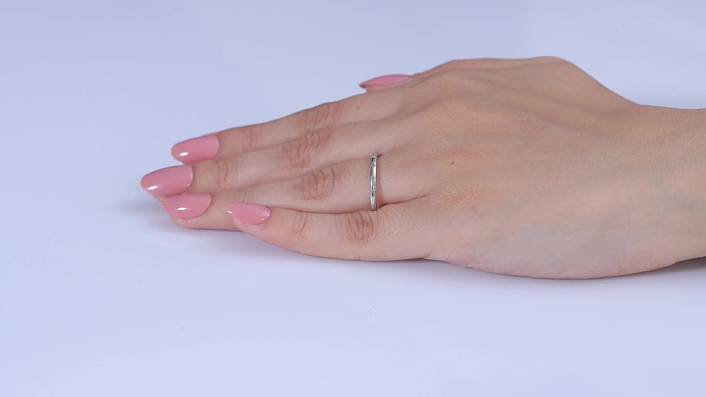 White Diamond Band Ring in Platinum Over Sterling Silver (Size 10.0) 0.05 ctw