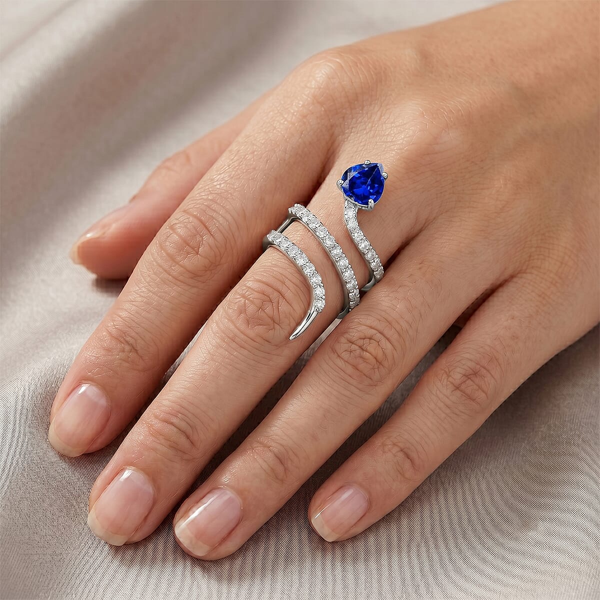 Simulated Blue and White Diamond Heart Head Snake Ring in Sterling Silver (Size 8.0) image number 1
