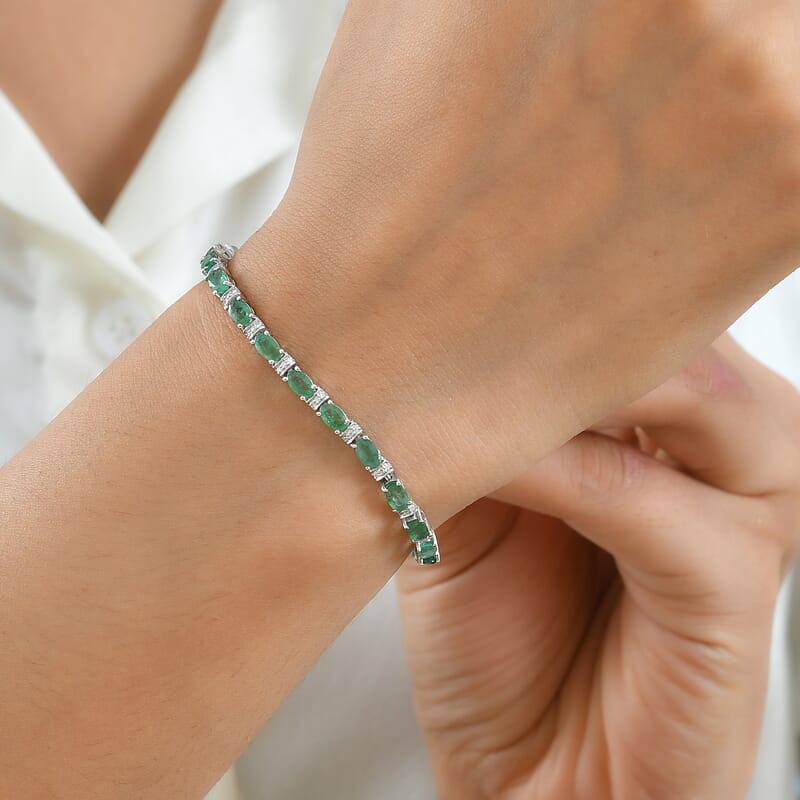 D'Joy Premium Kagem Zambian Emerald and Moissanite 5.35 ctw Dynasty Tennis Bracelet in Rhodium Over Sterling Silver (6.50 In)