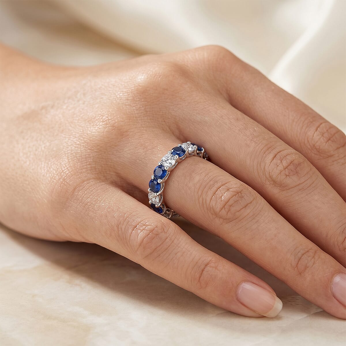 Simulated Blue Diamond and White Topaz Band Ring in Sterling Silver (Size 8.0) image number 1