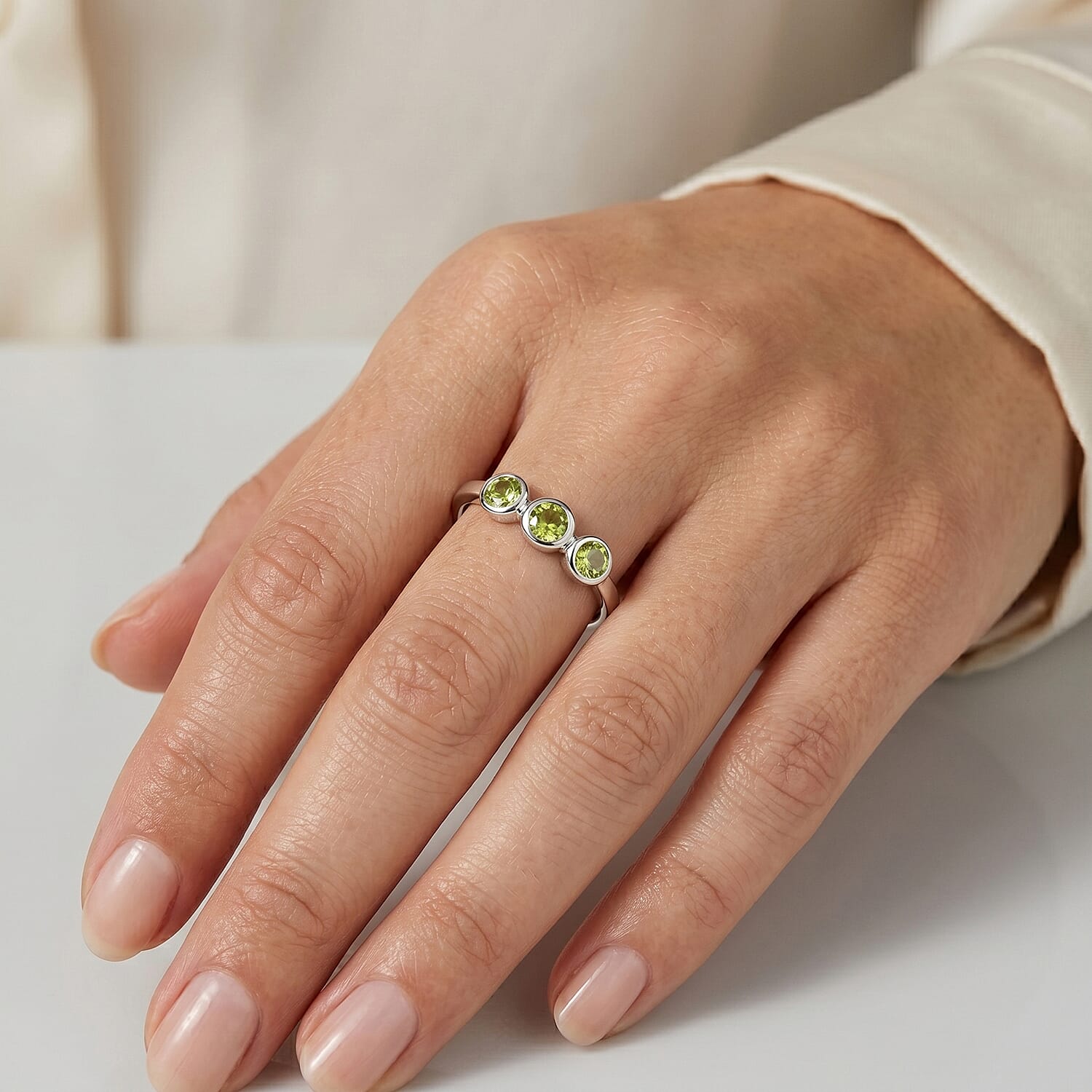 Hebei Peridot 0.09 ctw 3 Stone Ring in Sterling Silver (Size 6.0)