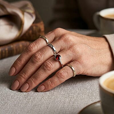 Mozambique Garnet and Simulated Diamond 0.65 ctw Ring in Sterling Silver (Size 7.0)