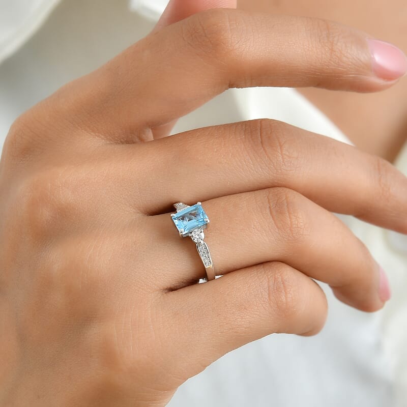 D'Joy Swiss Blue Topaz and Moissanite 1.50 ctw Ring in Rhodium Over Sterling Silver (Size 6.0)