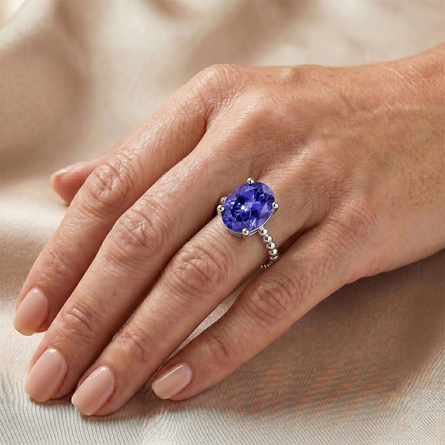 Simulated Blue Diamond Oval Solitaire Ring in Sterling Silver (Size 6.5)