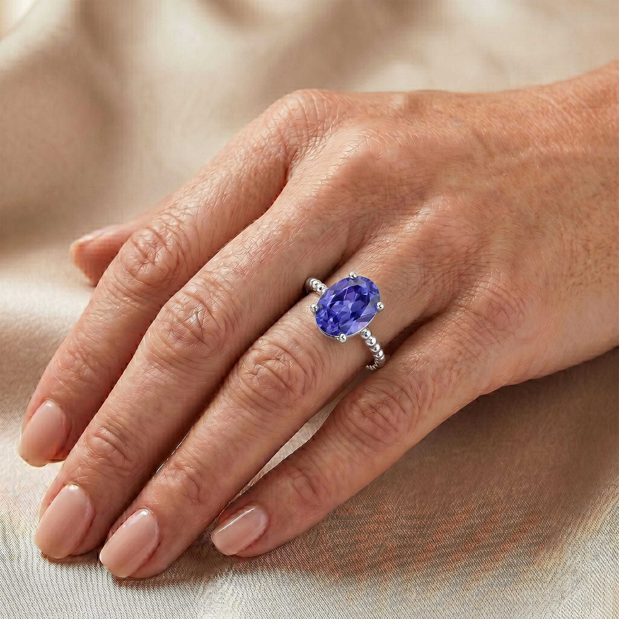 Simulated Blue Diamond Oval Solitaire Ring in Sterling Silver (Size 6.5)