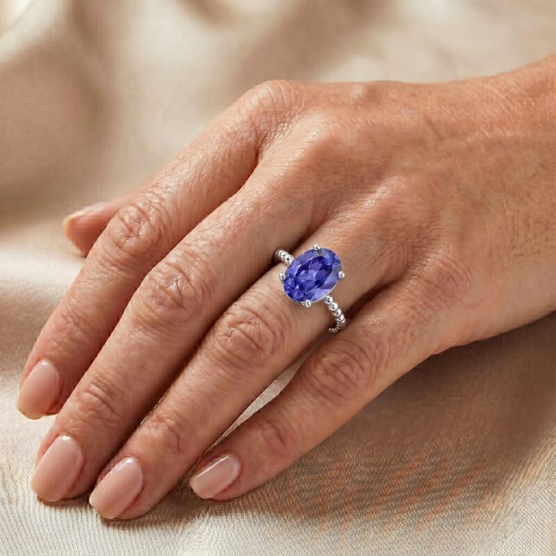 Simulated Blue Diamond Oval Solitaire Ring in Sterling Silver (Size 6.5)