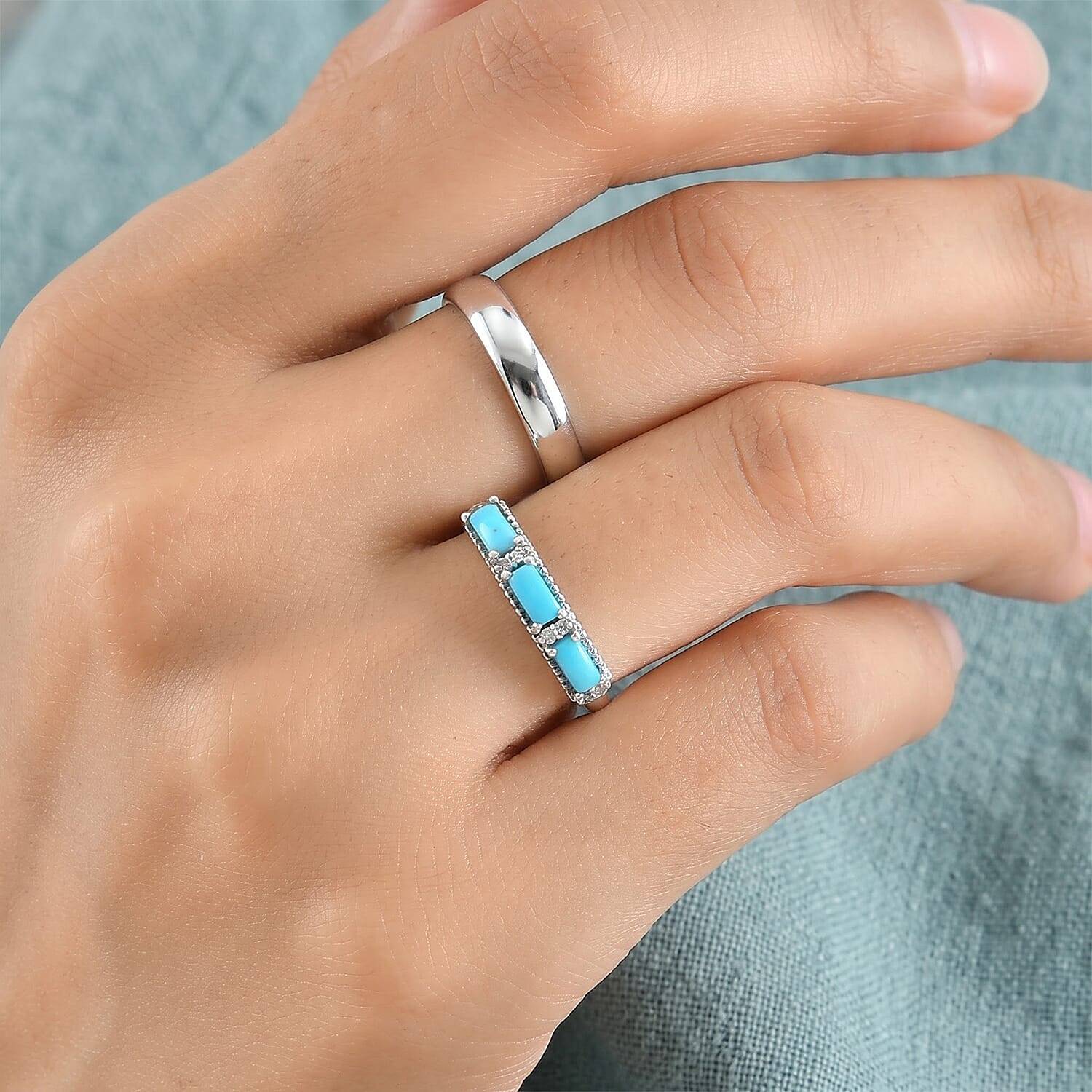 D'Joy Sleeping Beauty Turquoise and White Zircon 0.85 ctw Band Ring in Rhodium Over Sterling Silver (Size 6.0)
