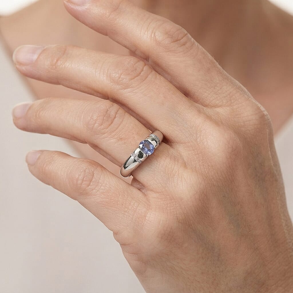 D'Joy Tanzanite and White Zircon 0.50 ctw Ring in Rhodium Over Sterling Silver (Size 6.0)