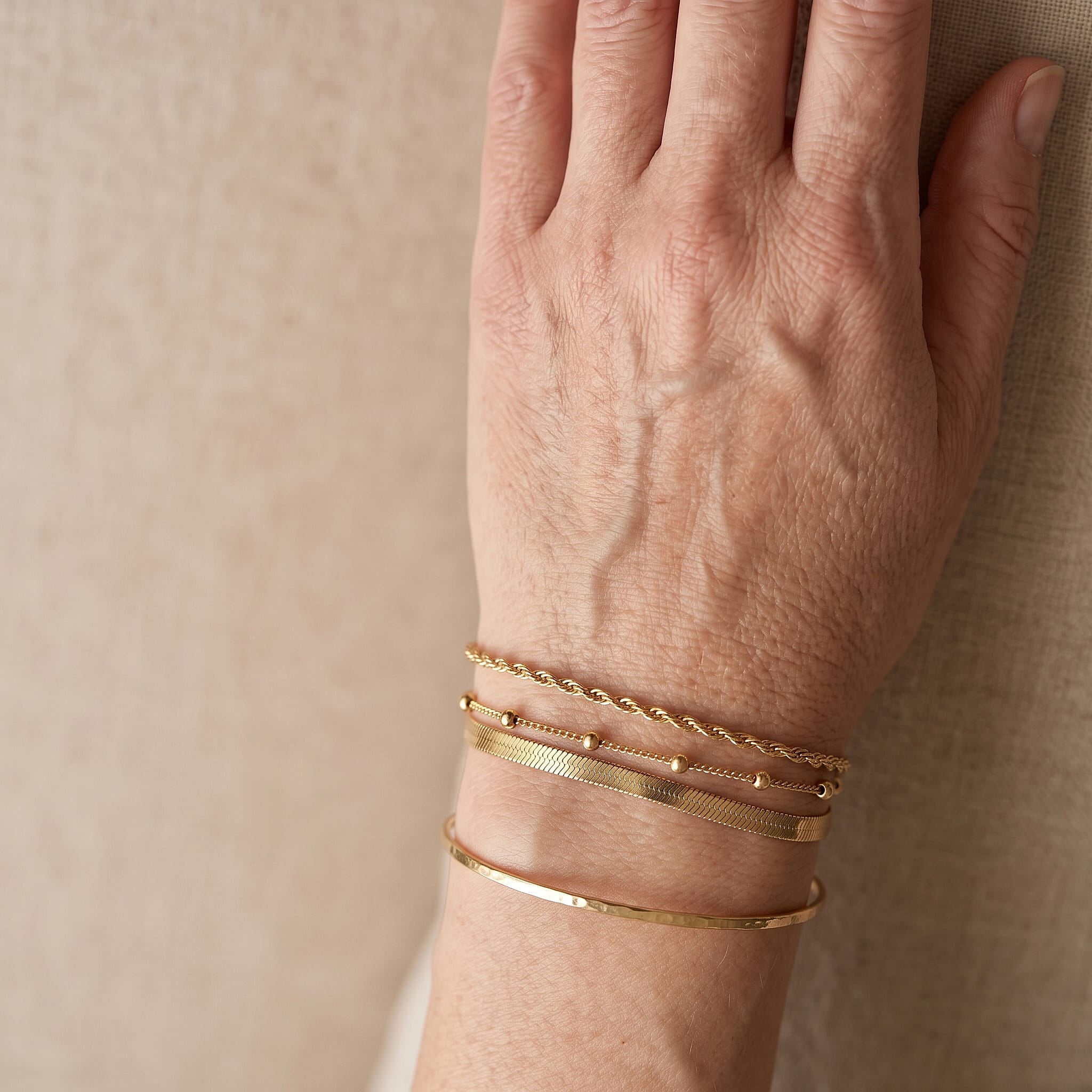 Smooth Snake Chain Bracelet in ION Plated YG Stainless Steel (7.50-9.50In)