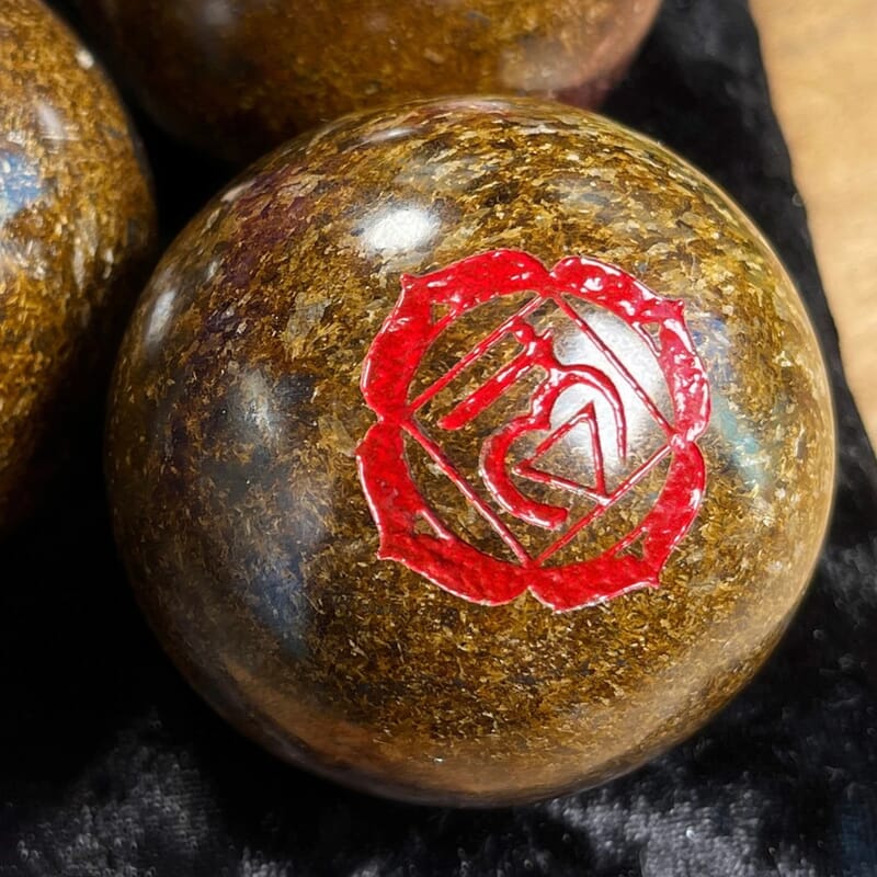 Root Chakra Symbol Engraved Bronzite Sphere 1400ctw