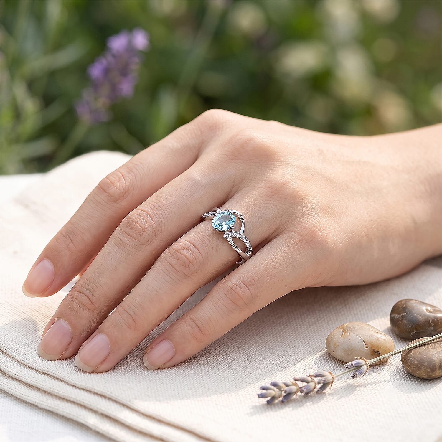 Blue Topaz and Simulated Diamond 0.88 ctw Ring in Sterling Silver (Size 8.0)