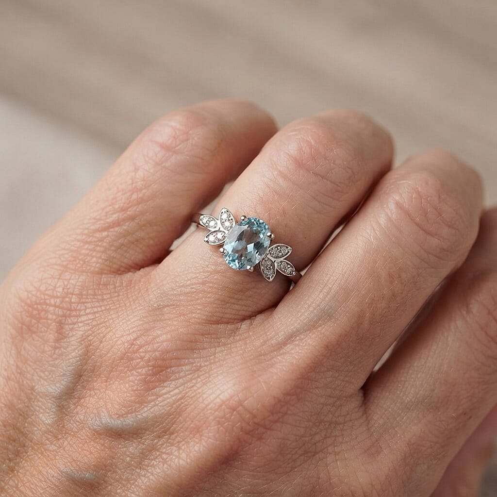 Blue Topaz and Simulated Diamond 0.96 ctw Ring in Sterling Silver (Size 7.0)