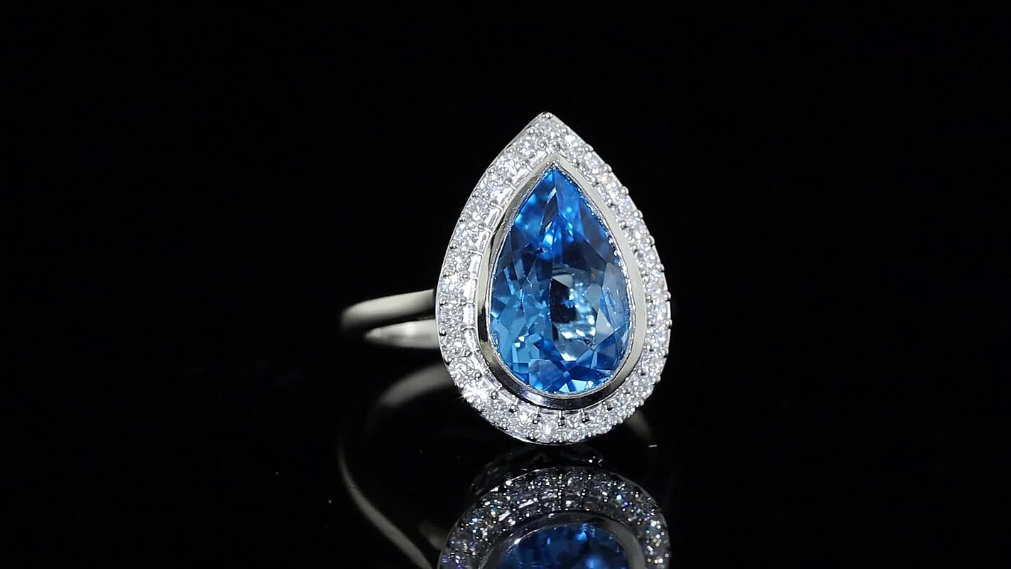 D''Joy Premium Swiss Blue Topaz, Moissanite Ring in Rhodium Over Sterling Silver (Size 10.0) 5.50 ctw